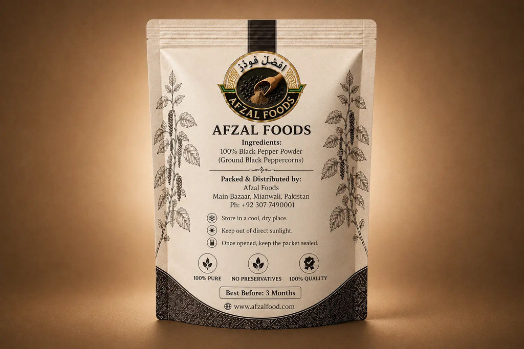 Back of Afzal Foods Black Pepper Powder packaging with ingredients, storage instructions and manufacturer information.